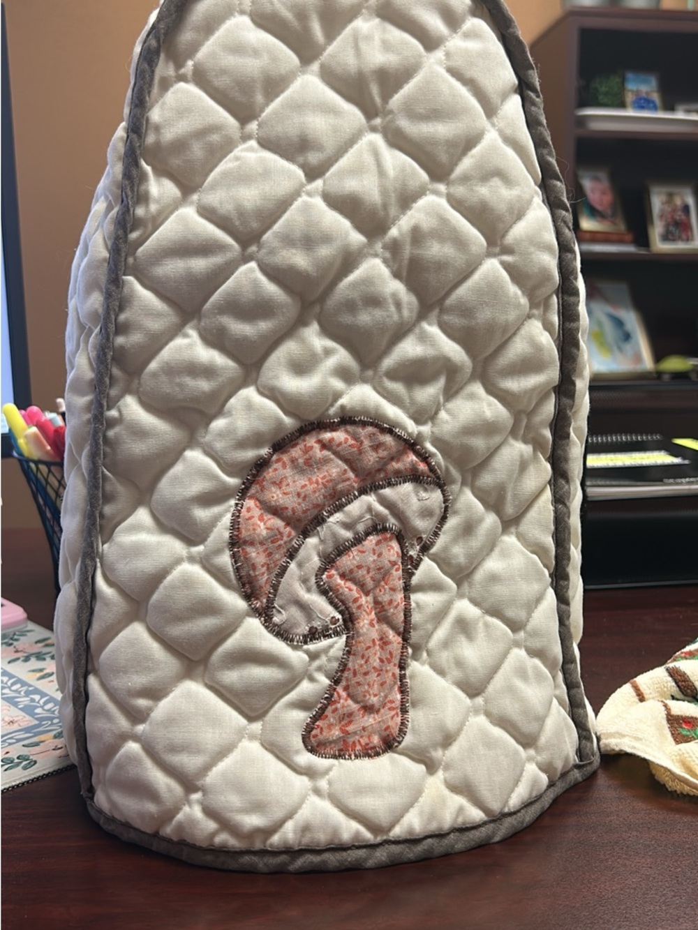 Cream Quilted Mushroom Tea Cozy with Gray Trim